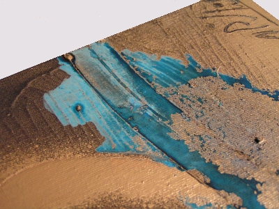 A gold, teal and powder blue painting. 