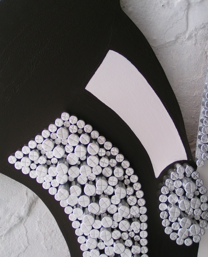 A platinum, white and black wall sculpture. abstract color painting