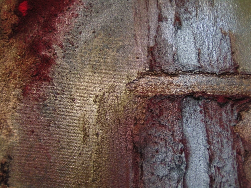 A bronze, scarlet and rust painting. 