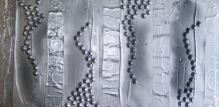 A grey, platinum and silver painting